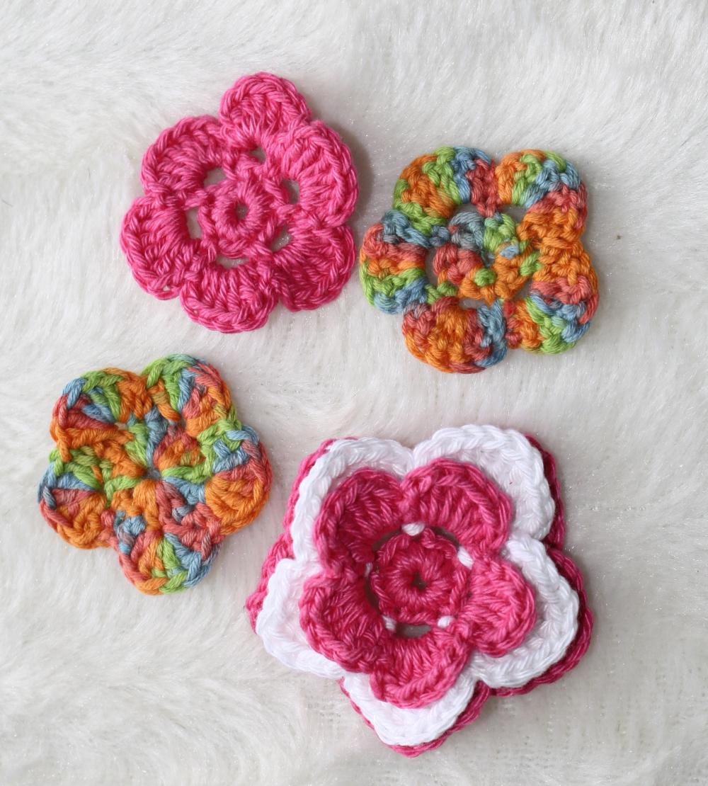 set of 4 crochet flowers.